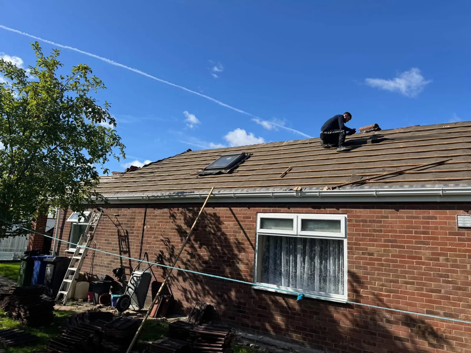 Bungalow re roof tiles stripped